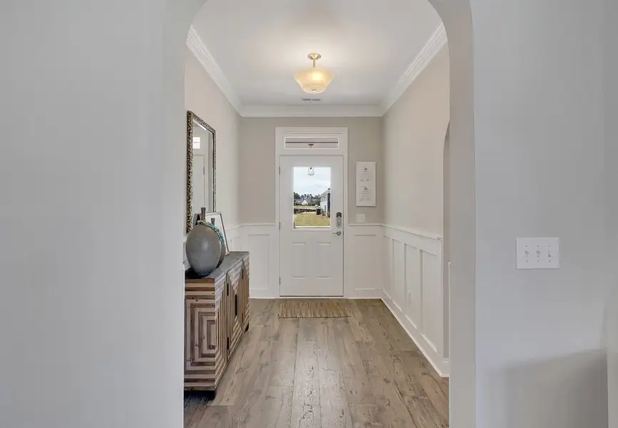 Representative furnished interior of a home built from the Promenade by McKee Homes in The Cottages at 78 North, Sanford (Image 17).
