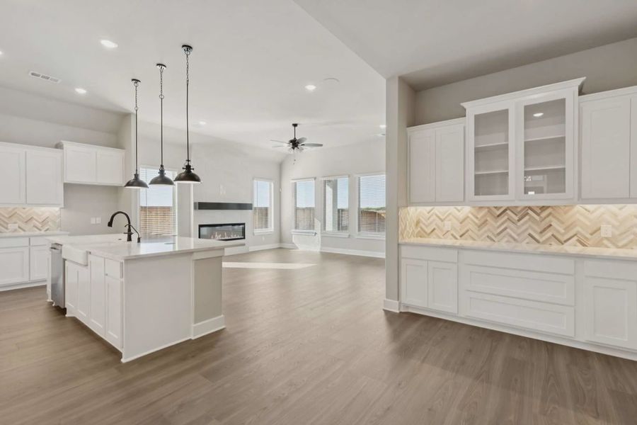 Representative furnished interior of a home built from the Windcrest by Chesmar Homes in Talia, Mesquite (Image 3).