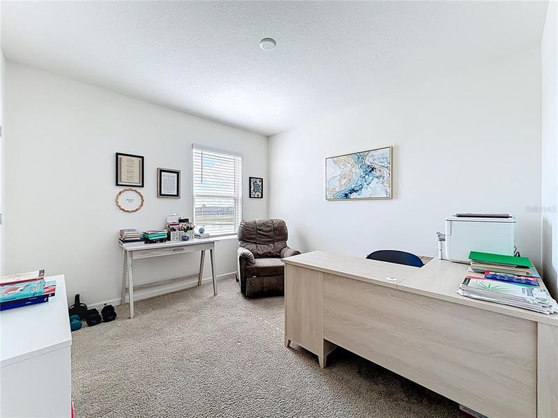 Furnished interior view inside a new home in Cypress Bay West, Palm Bay (Image 35).