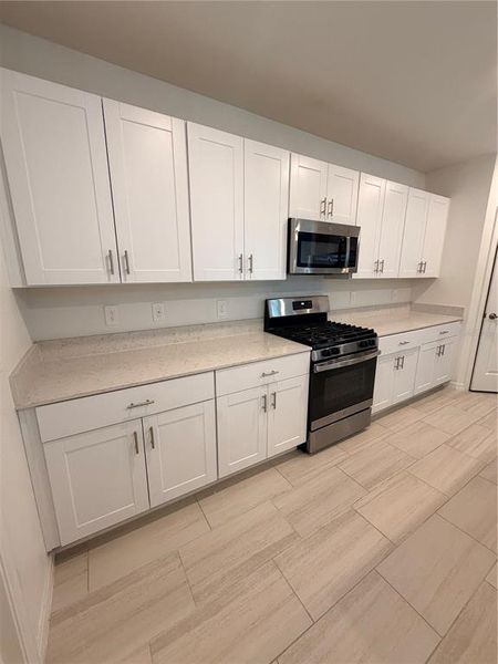 Furnished interior view inside a new home in , Parrish (Image 15).