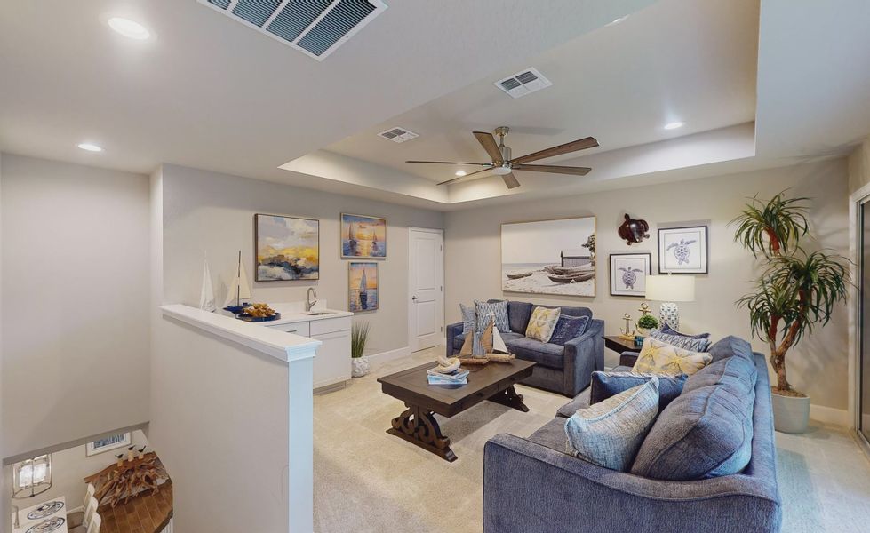 Furnished interior view inside a new home in Plantation Bay, Ormond Beach (Image 18).
