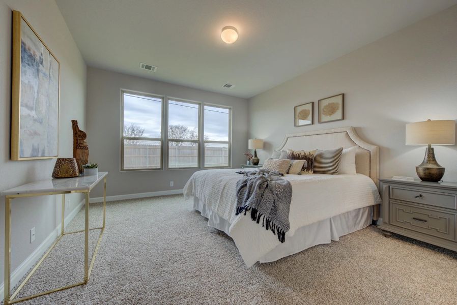 Representative furnished interior of a home built from the Cleburne by Ashton Woods in Mustang Oaks, San Antonio (Image 32).