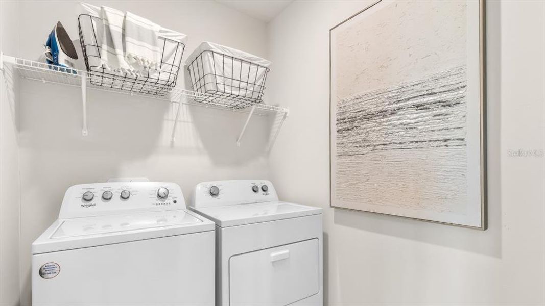 Furnished interior view inside a new home in Central Parc, North Port (Image 7).
