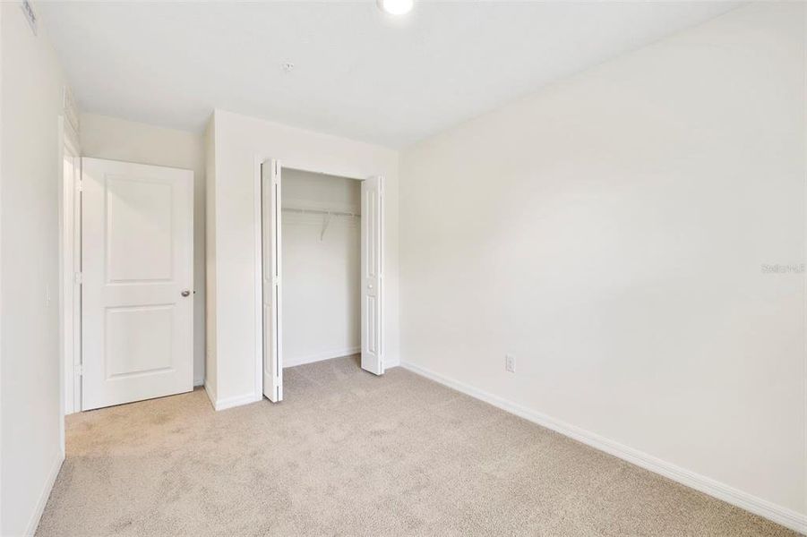 Spacious, unfurnished interior of a new home in Towns at Riverwalk, Sanford (Image 24).