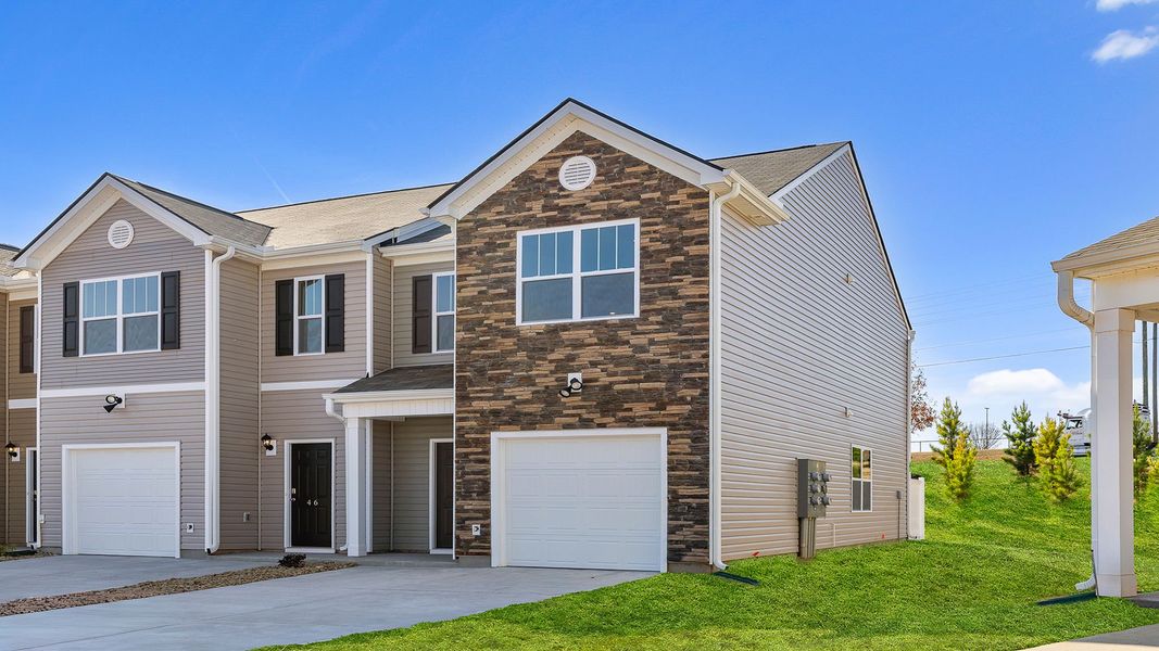 Front exterior of a new home in Brookside Ridge Townhomes, Greer, SC, highlighting curb appeal (Image 2).