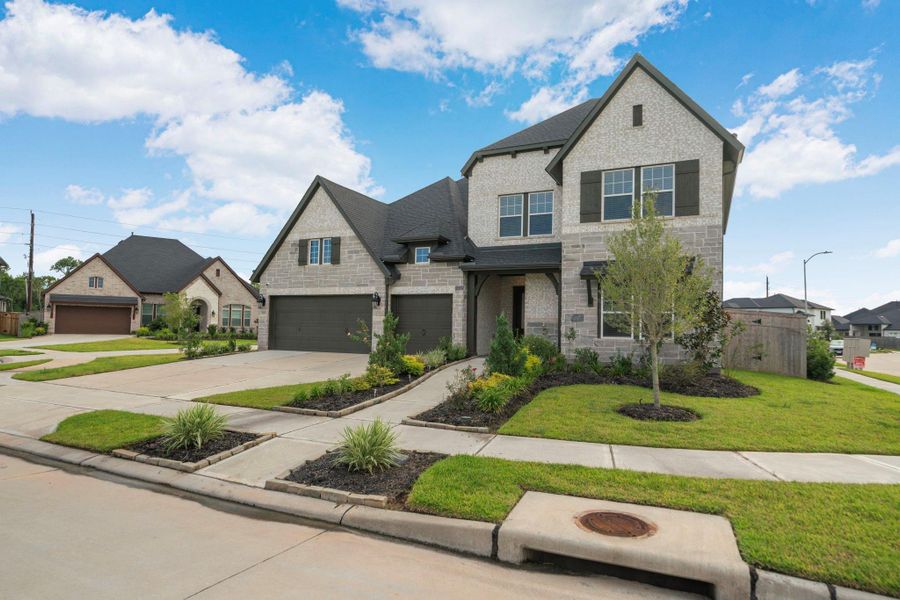 Front exterior of a new home in , Missouri City, TX, highlighting curb appeal (Image 25). Front exterior of a new home in , Missouri City, TX, highlighting curb appeal (Image 25).