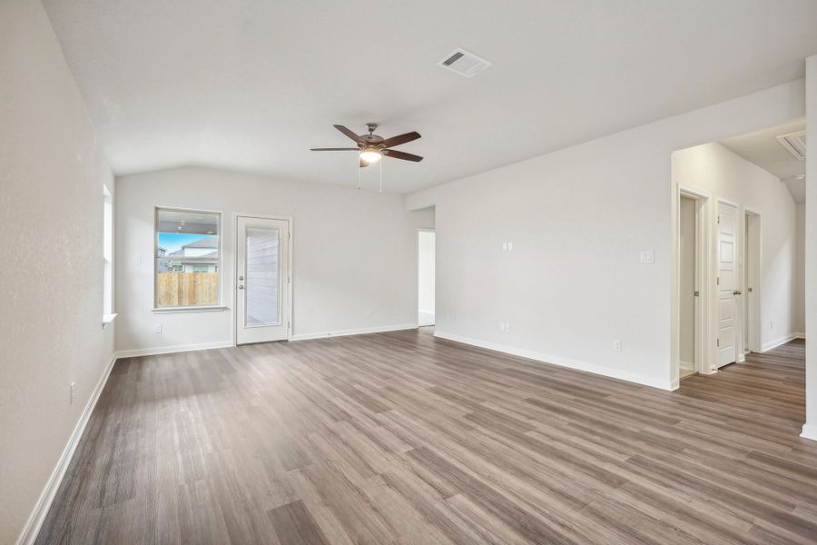 Living room in the Allen floorplan at a Meritage Homes community.