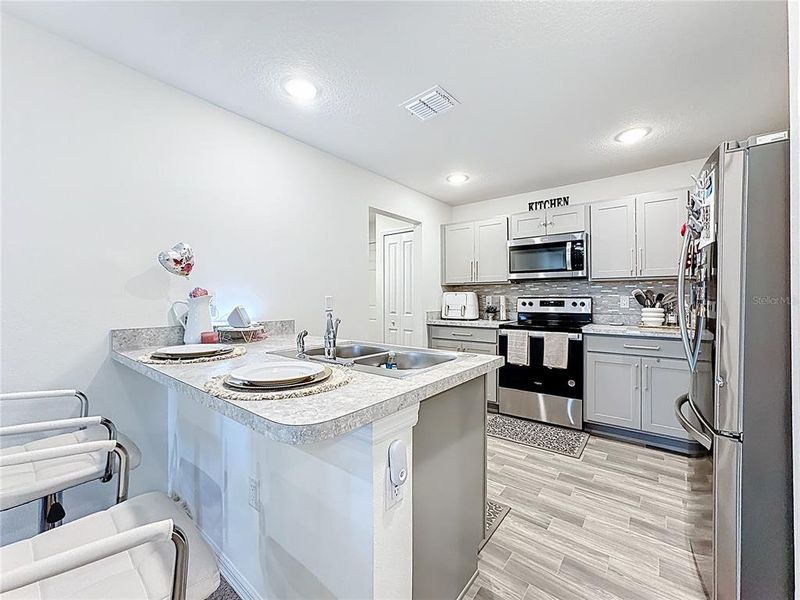 Furnished interior view inside a new home in , Kissimmee (Image 35). Furnished interior view inside a new home in , Kissimmee (Image 35).
