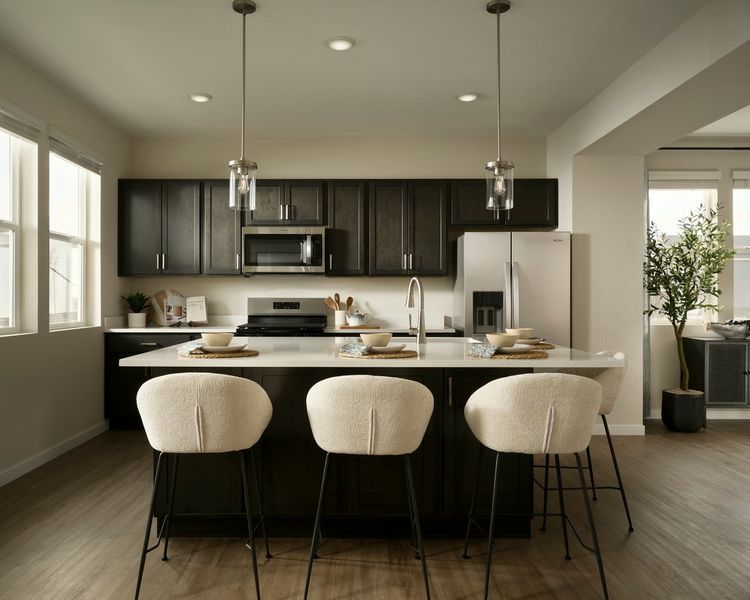 Furnished interior view inside a new home in Barefoot, Firestone (Image 4).