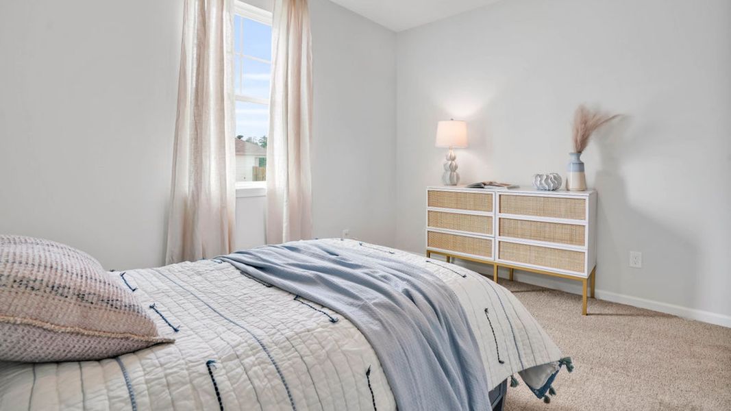 Representative furnished interior of a home built from the LEWIS by D.R. Horton in The Cottages at Blake Farm, Wilmington (Image 13).