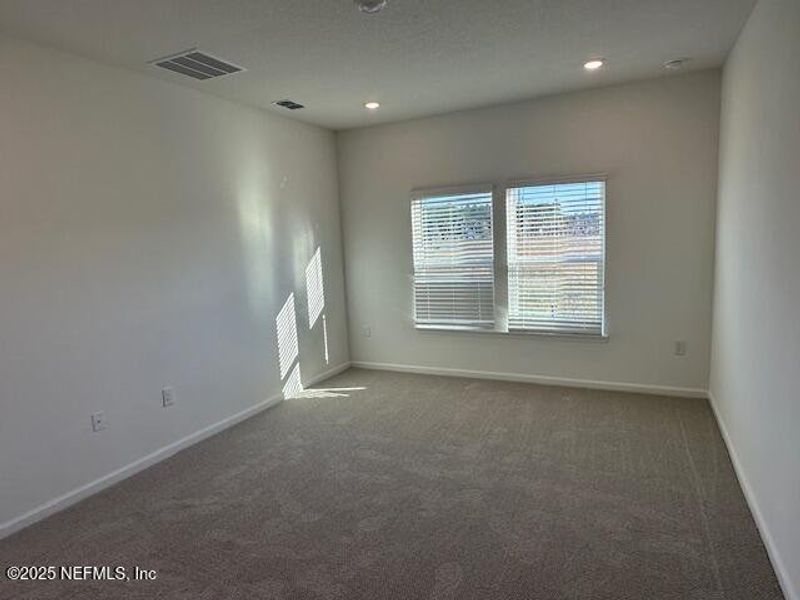 Spacious, unfurnished interior of a new home in Brook Forest - Villas, St. Augustine (Image 13).