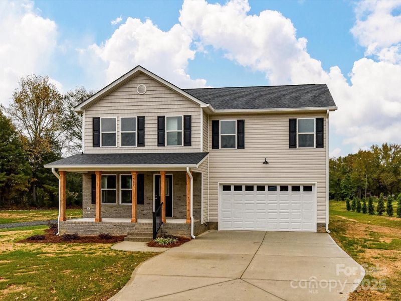 Front exterior of a new home in , Oakboro, NC, highlighting curb appeal (Image 20).