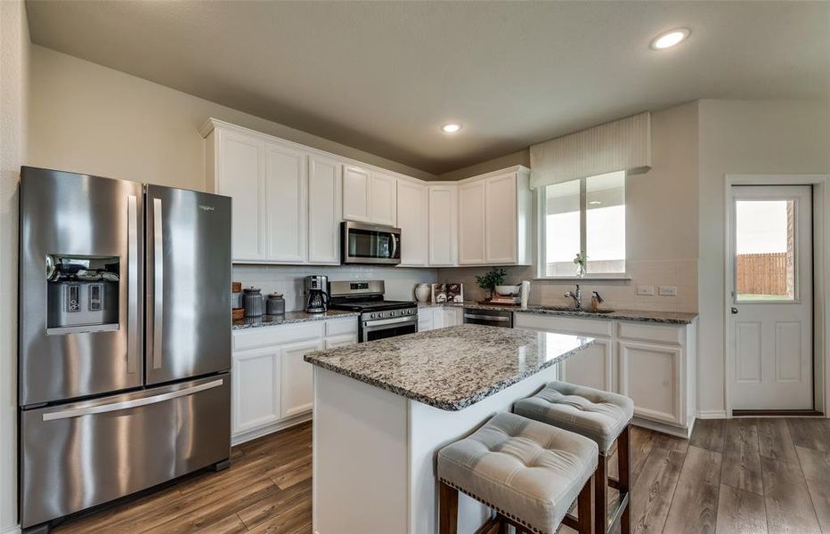 Roomy kitchen designed for functionality and comfort, with plenty of workspace *Real Home pictured, former model.