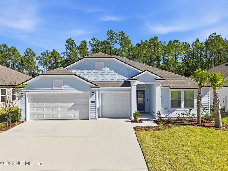 Front exterior of a new home in , Palm Coast, FL, highlighting curb appeal (Image 1). Front exterior of a new home in , Palm Coast, FL, highlighting curb appeal (Image 1).