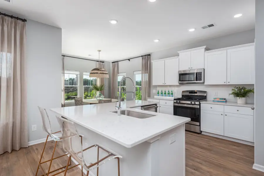 Furnished interior view inside a new home in Sweetgrass at Summers Corner, Summerville (Image 10).