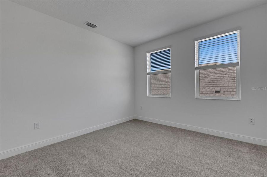 Spacious, unfurnished interior of a new home in Hawkstone, Sarasota (Image 55).