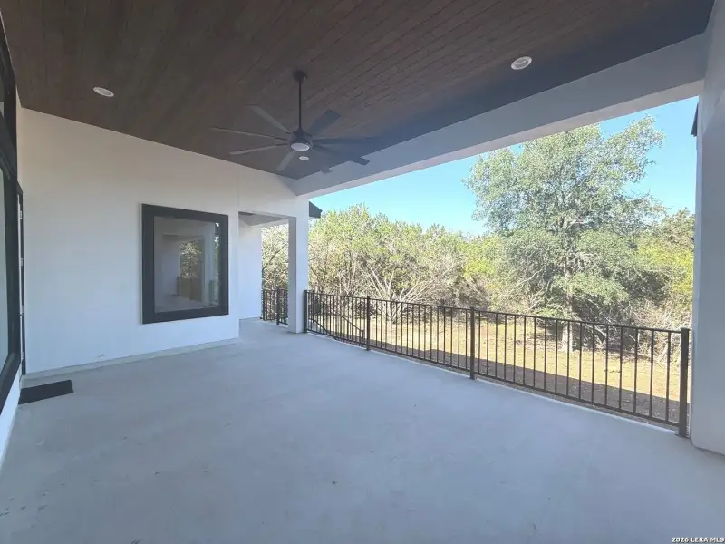 Exterior details and patio area of a home in , Spring Branch (Image 31).