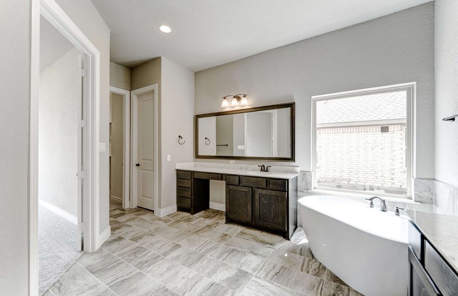 Representative furnished interior of a home built from the 3799 by Ravenna Homes in Artavia 70′, Conroe (Image 15).