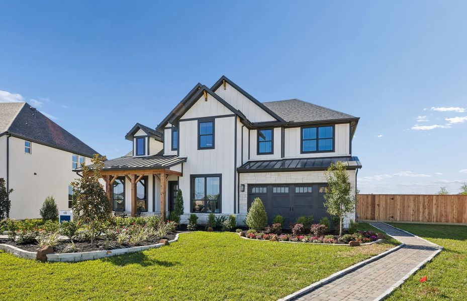 Representative exterior photo of a completed home built from the Ferris by Pulte Homes in Ryehill, Rosenberg, TX (Image 23).