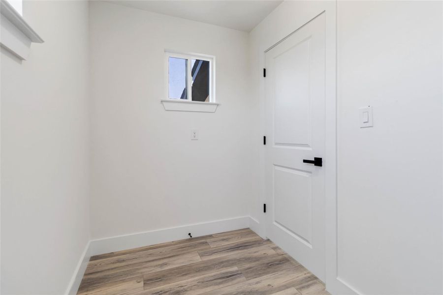 Dedicated storage area and water heater space conveniently located on the second level. Dedicated storage area and water heater space conveniently located on the second level.