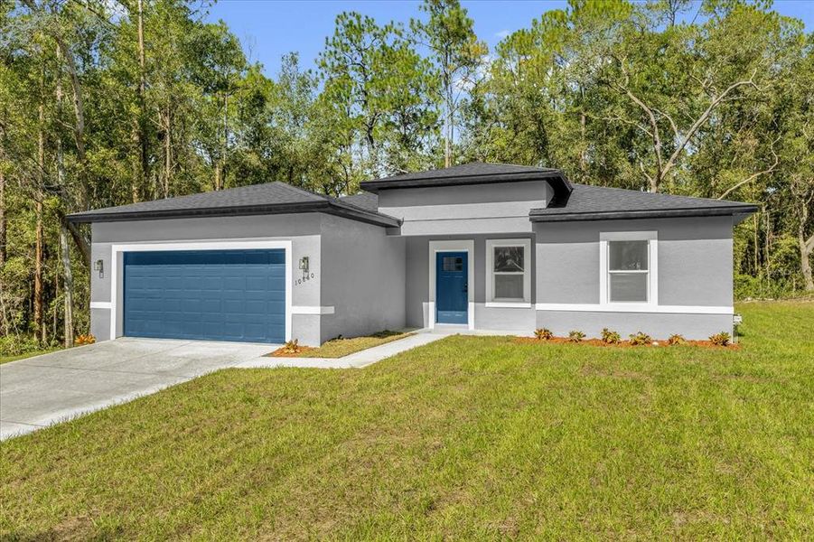 Front exterior of a new home in , Citrus Springs, FL, highlighting curb appeal (Image 19).