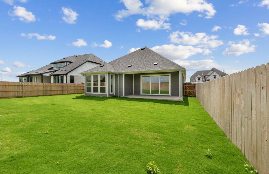 Front exterior of a new home in Kuempel Estates, Pflugerville, TX, highlighting curb appeal (Image 2). Front exterior of a new home in Kuempel Estates, Pflugerville, TX, highlighting curb appeal (Image 2).