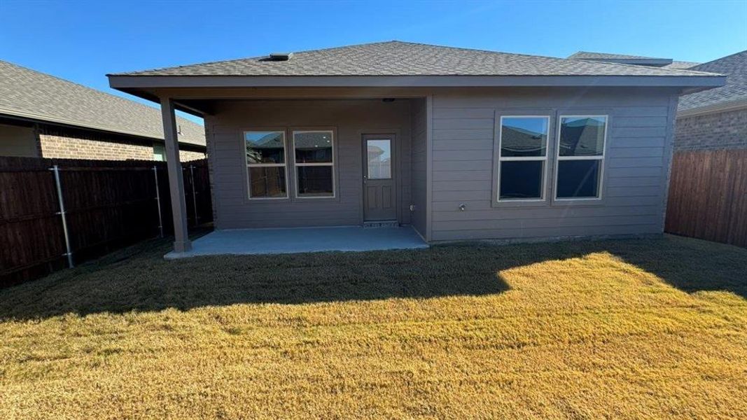 Exterior details and patio area of a home in Monarch at the Meadows, Ponder (Image 2).