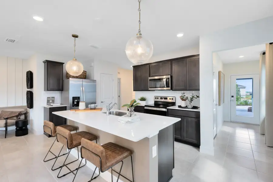 Representative furnished interior of a home built from the Daylen by Pulte Homes in Waypointe, Port Orange (Image 5).