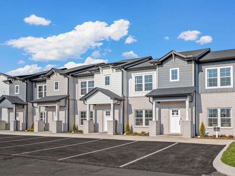 Front exterior of a new home in The Towns at Red River, Gallatin, TN, highlighting curb appeal (Image 2). Front exterior of a new home in The Towns at Red River, Gallatin, TN, highlighting curb appeal (Image 2).