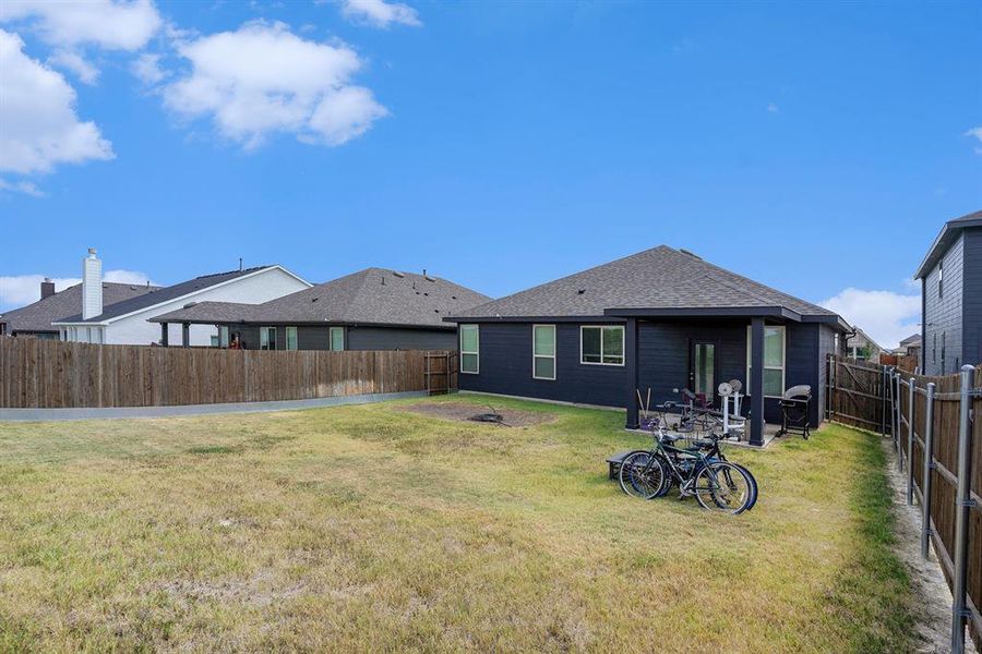 Front exterior of a new home in , Godley, TX, highlighting curb appeal (Image 17). Front exterior of a new home in , Godley, TX, highlighting curb appeal (Image 17).