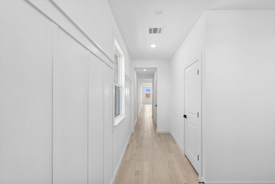 Inviting foyer with decorative feature wall