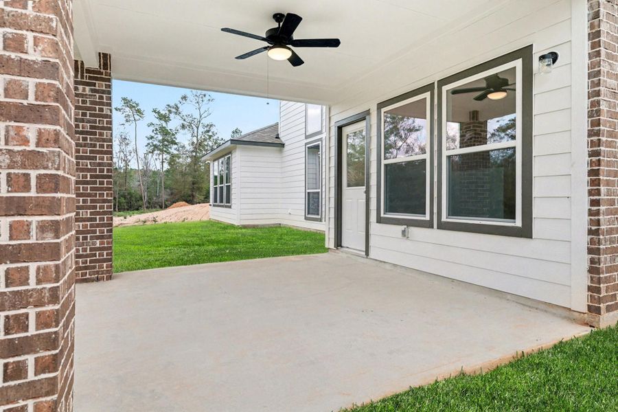 Exterior details and patio area of a home in Oakwood Ranch, Willis (Image 23). Exterior details and patio area of a home in Oakwood Ranch, Willis (Image 23).