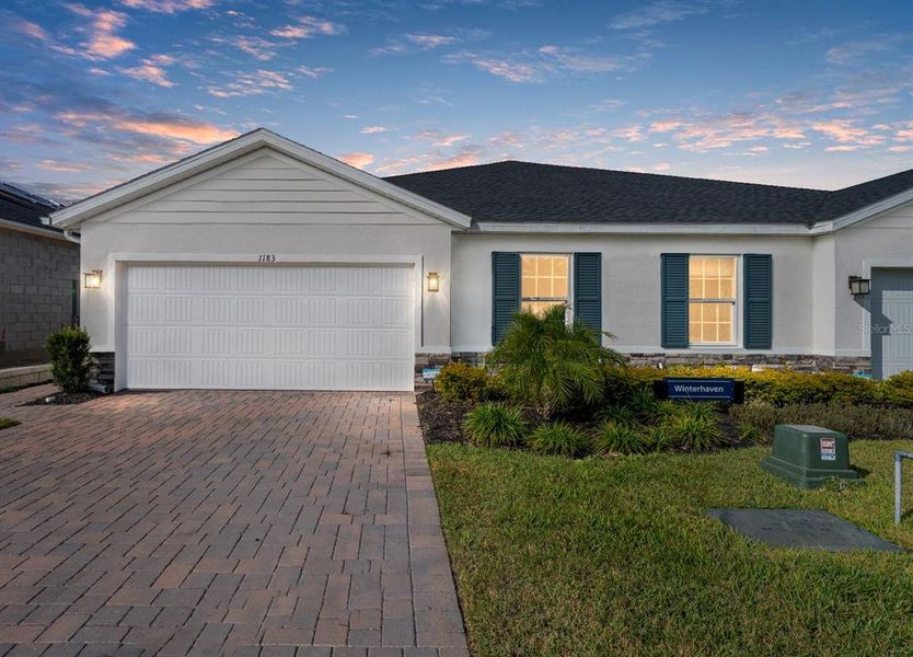 Front exterior of a new home in , Lady Lake, FL, highlighting curb appeal (Image 2). Front exterior of a new home in , Lady Lake, FL, highlighting curb appeal (Image 2).