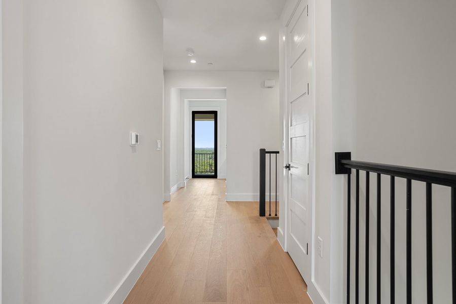 Spacious, unfurnished interior of a new home in Milky Way at River Place, Austin (Image 21).