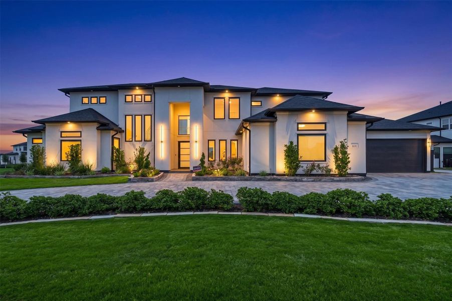 Experience elevated living in this stunning custom luxury home by renowned builder Partners in Building, known for exceptional craftsmanship and timeless design. Perfectly situated in the prestigious 90-foot section of Harvest Green, this contemporary masterpiece offers sophisticated architecture, expansive living spaces, and resort-style amenities throughout.