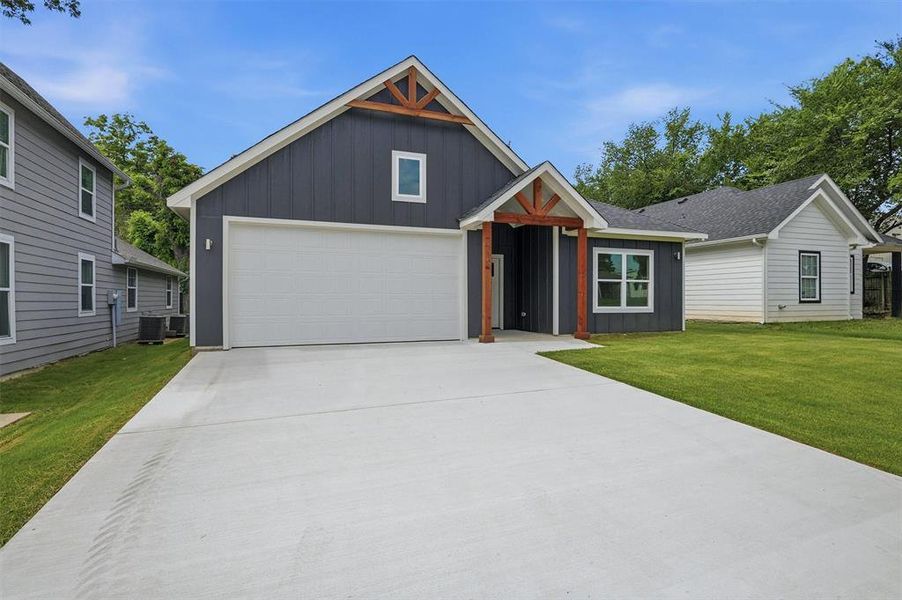 Front exterior of a new home in , Denison, TX, highlighting curb appeal (Image 1). Front exterior of a new home in , Denison, TX, highlighting curb appeal (Image 1).