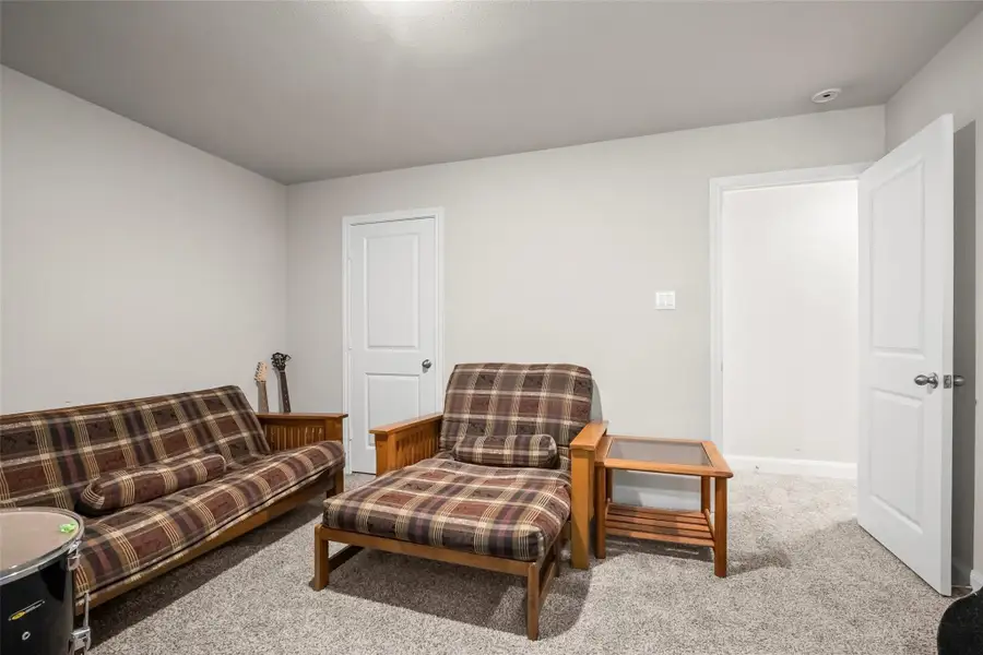 Furnished interior view inside a new home in , Conroe (Image 11).