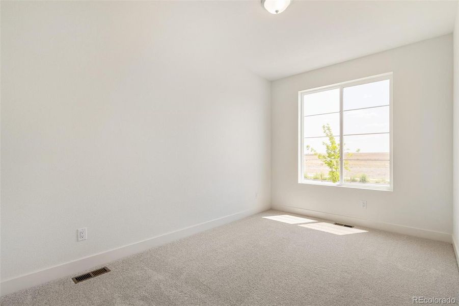 Spacious, unfurnished interior of a new home in Legato, Commerce City (Image 24).