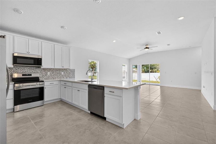 Furnished interior view inside a new home in , Port Charlotte (Image 6). Furnished interior view inside a new home in , Port Charlotte (Image 6).