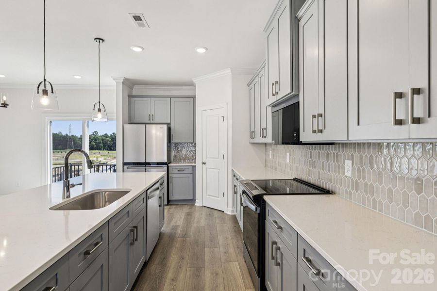 Photo is not of the actual home, but is an inspirational photo of builder’s model home and may depict options, furnishings, and/or decorator features that are not included