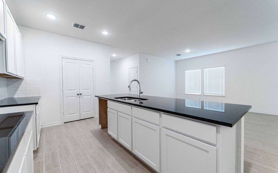 Furnished interior view inside a new home in Hunter's Ranch, San Antonio (Image 5).
