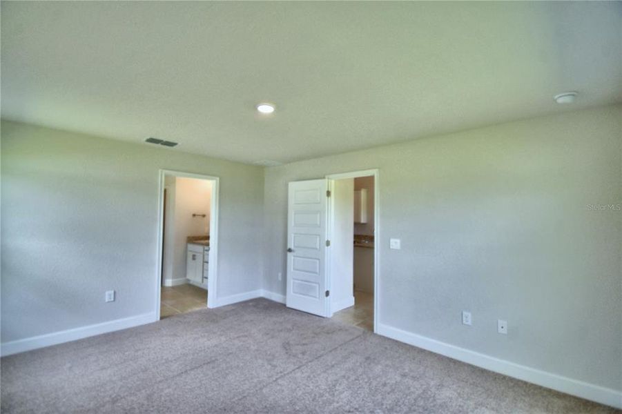 Spacious, unfurnished interior of a new home in Cadence Crossing, Auburndale (Image 20).