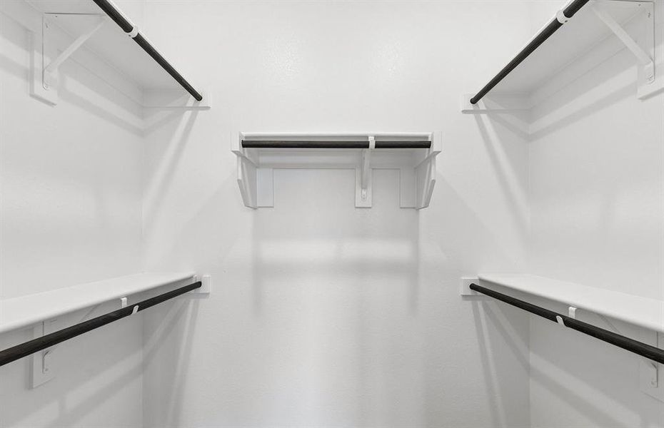 Walk in closet in primary suite Walk in closet in primary suite