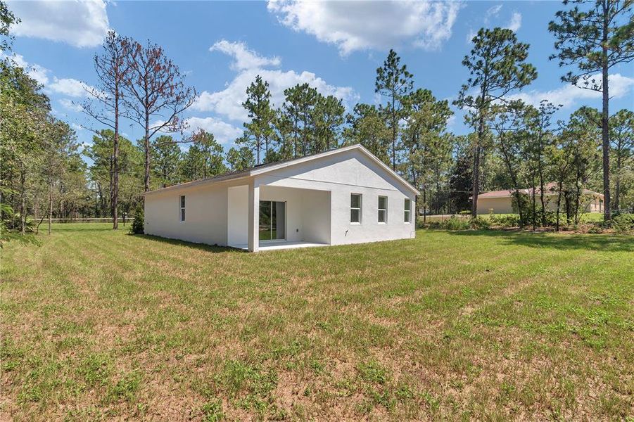Front exterior of a new home in , Ocala, FL, highlighting curb appeal (Image 33).