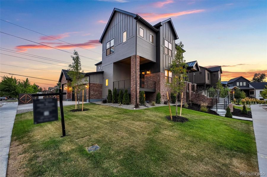 Front exterior of a new home in , Lakewood, CO, highlighting curb appeal (Image 25).