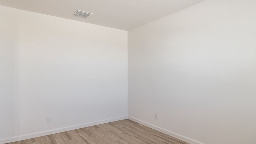 Spacious, unfurnished interior of a new home in Zanjero Pass, Waddell (Image 18).