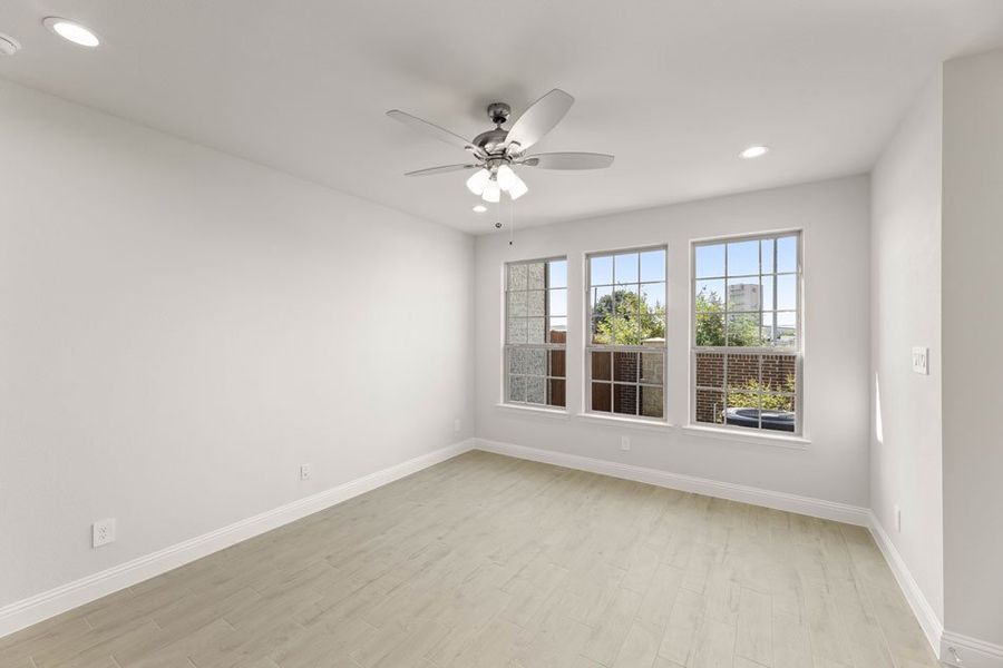 Front exterior of a new home in Main Street Village, Mansfield, TX, highlighting curb appeal (Image 6). Front exterior of a new home in Main Street Village, Mansfield, TX, highlighting curb appeal (Image 6).
