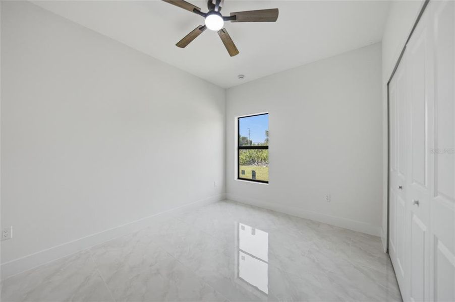 Spacious, unfurnished interior of a new home in , Port Charlotte (Image 35).