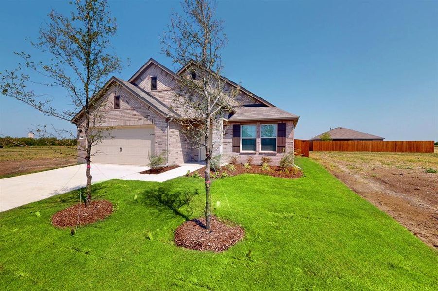 Front exterior of a new home in Verandah, Royse City, TX, highlighting curb appeal (Image 15).