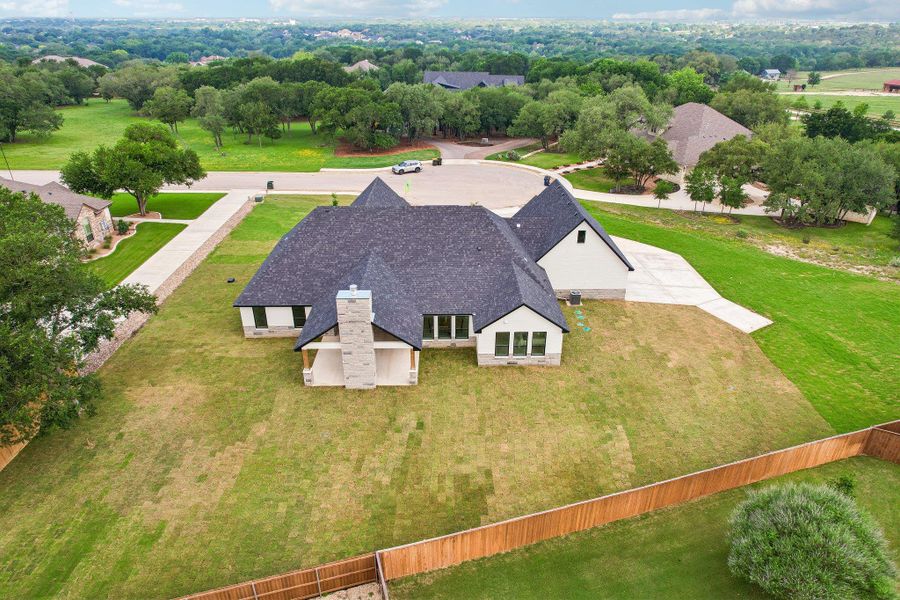 Front exterior of a new home in , Salado, TX, highlighting curb appeal (Image 26). Front exterior of a new home in , Salado, TX, highlighting curb appeal (Image 26).